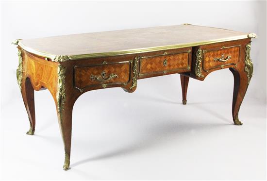 A French Louis XV style kingwood, parquetry and ormolu mounted bureau plat, 5ft 11in. x 3ft x 2ft 7in.